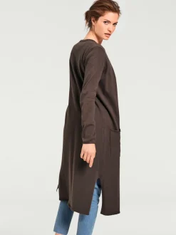 Veste longue en tricot à col montant avec poches et manches longues