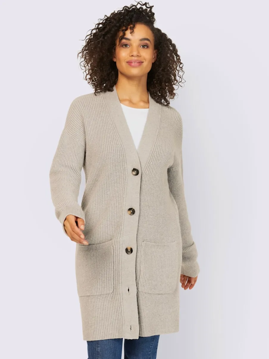 Veste longue en tricot à manches longues et poches