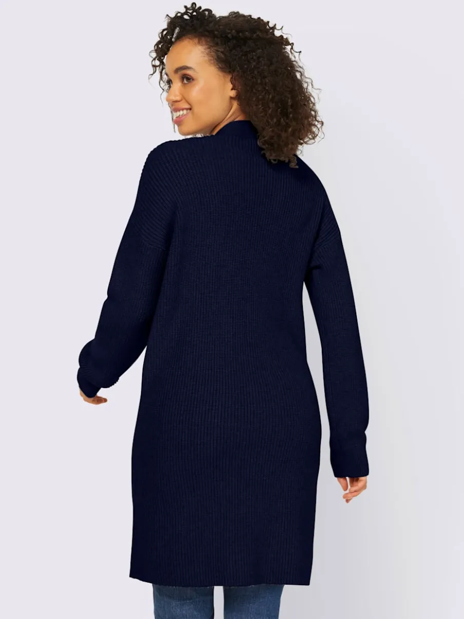 Veste longue en tricot à manches longues et poches
