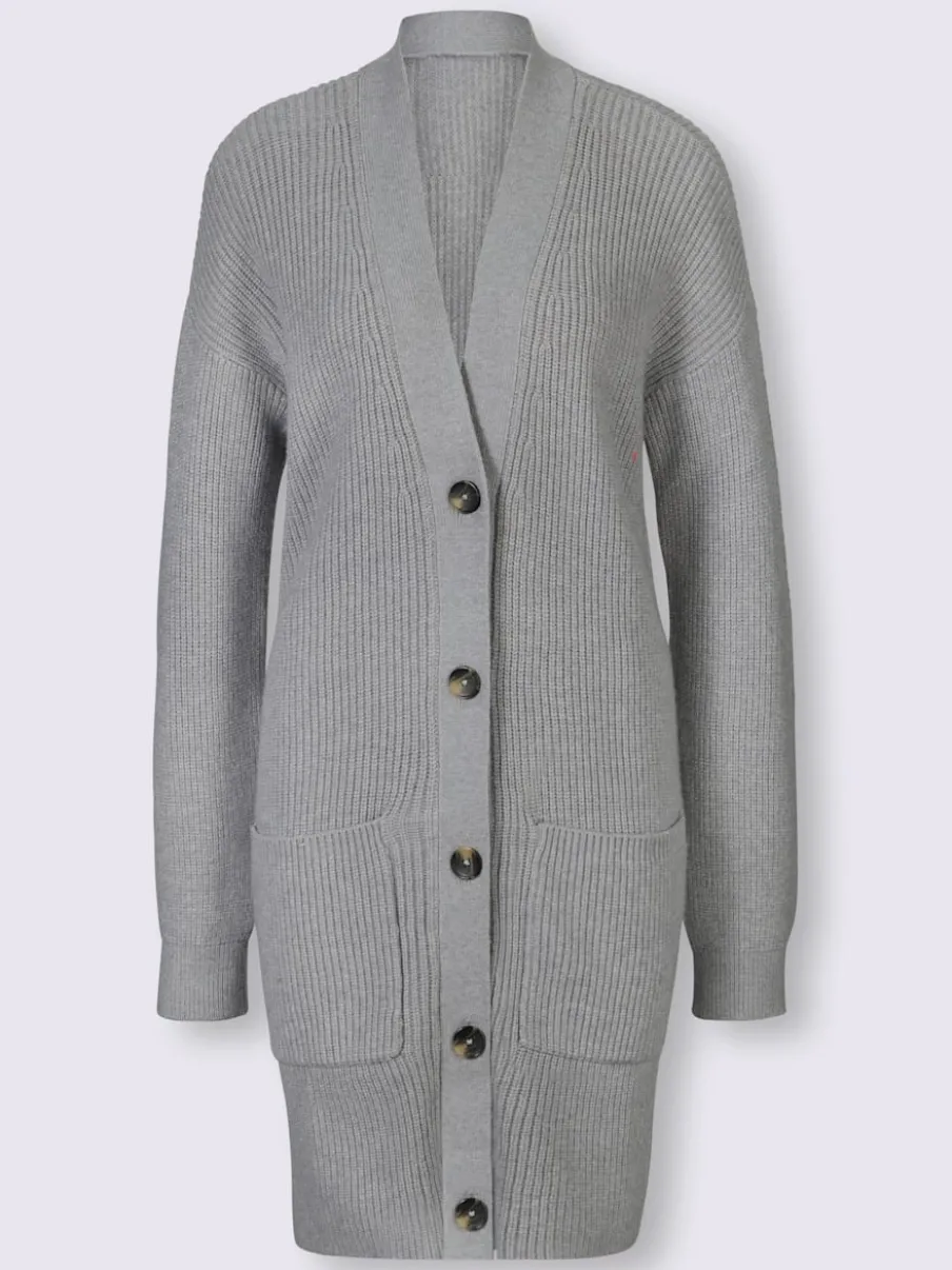 Veste longue en tricot à manches longues et poches