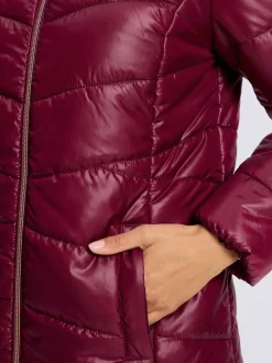 Veste longue matelassée avec capuche et poches pratiques