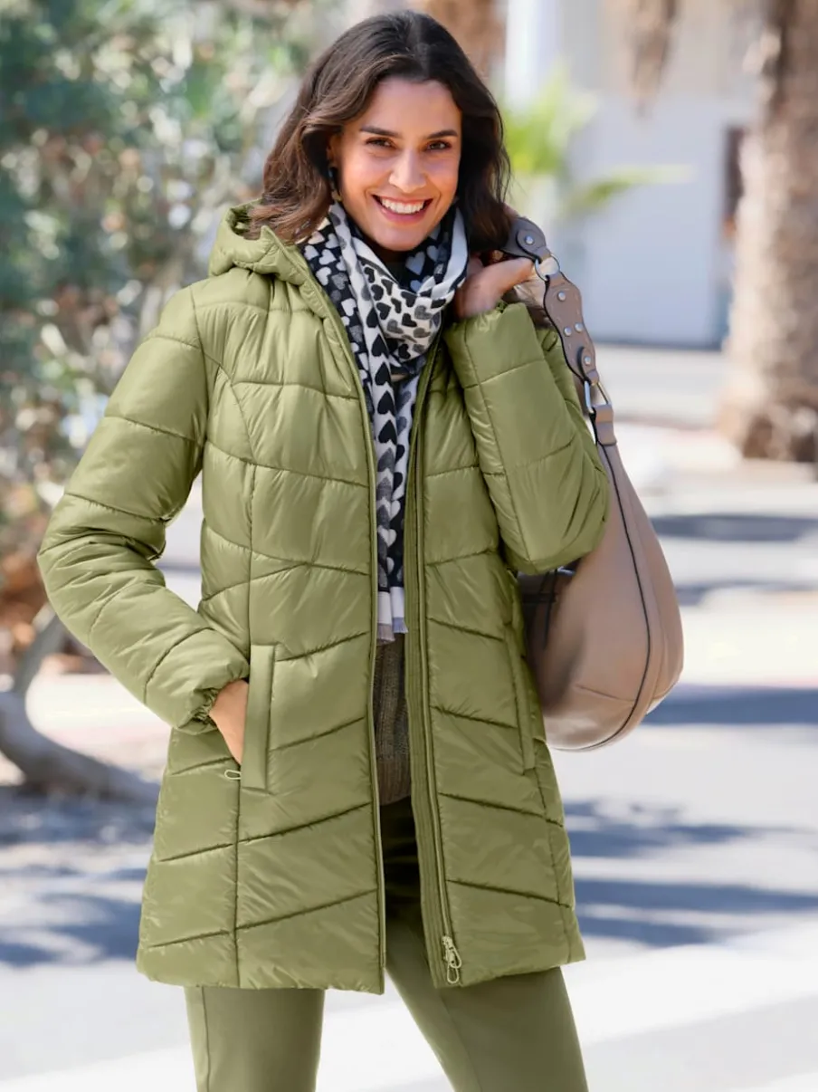 Veste longue matelassée avec capuche et poches pratiques