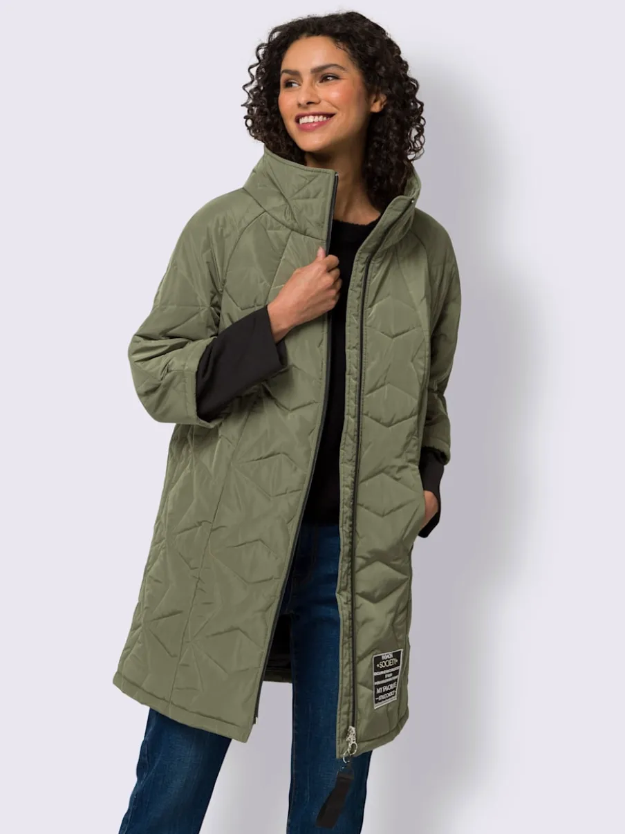 Veste longue matelassée à col montant et poches