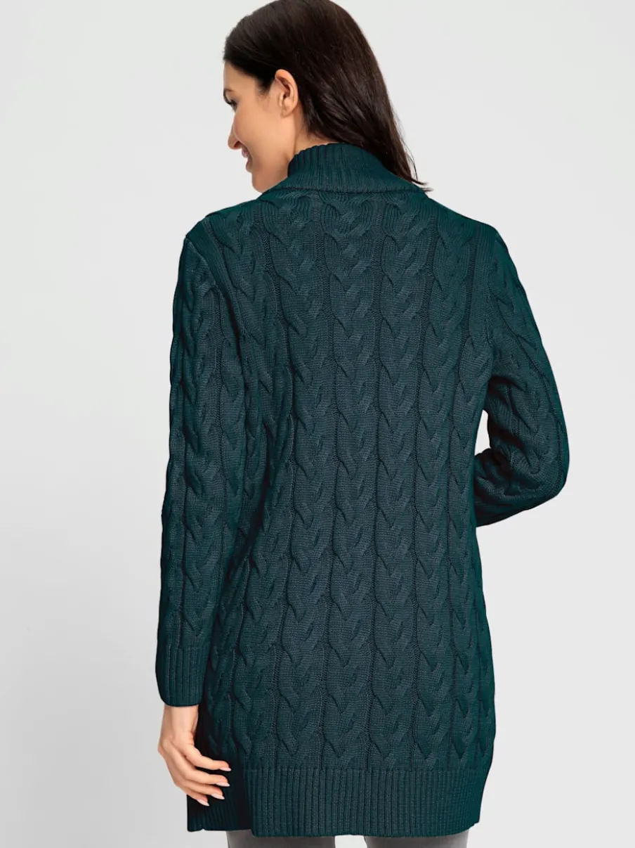 Veste longue tricotée avec col montant et poches