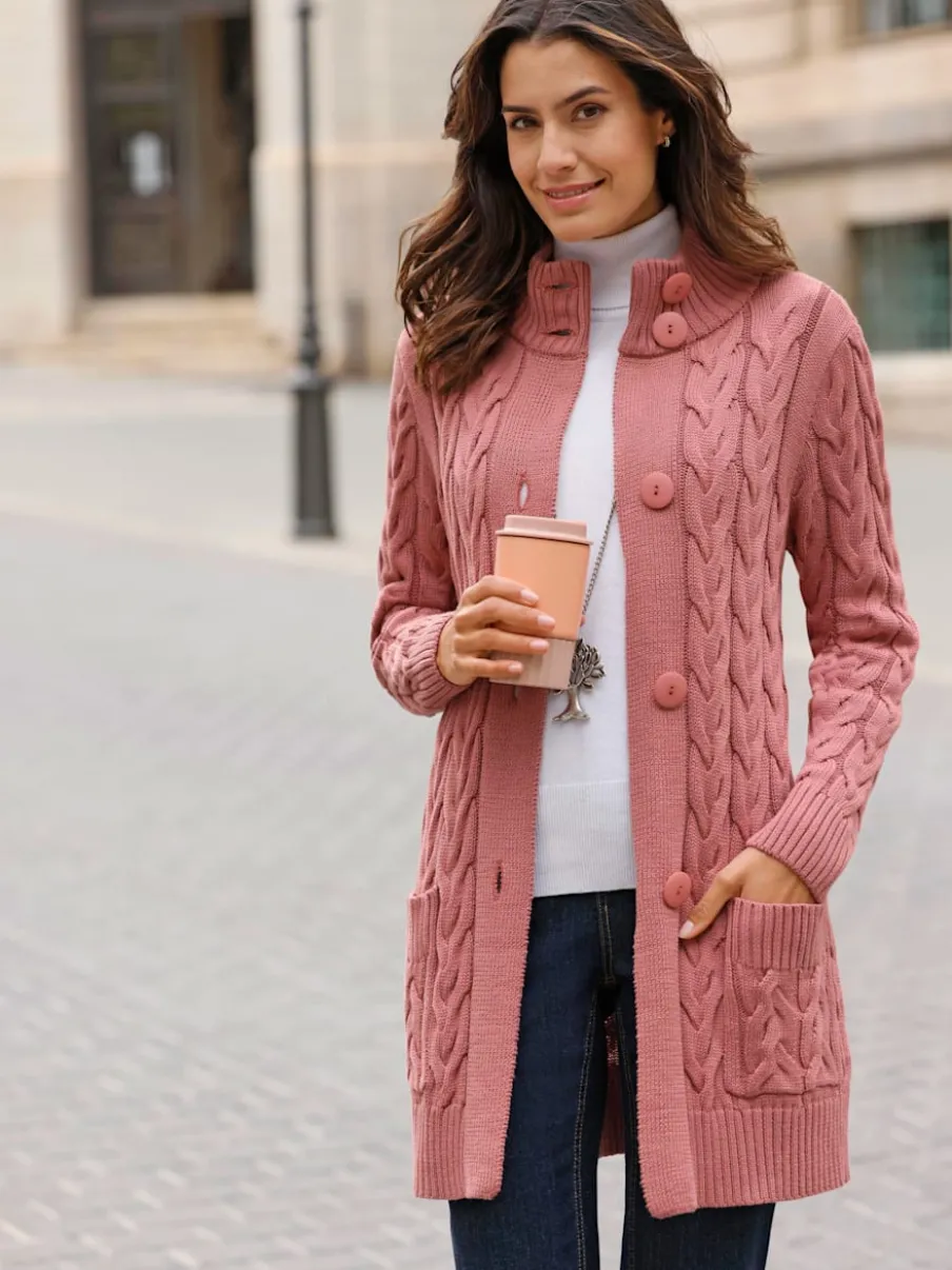 Veste longue tricotée avec col montant et poches