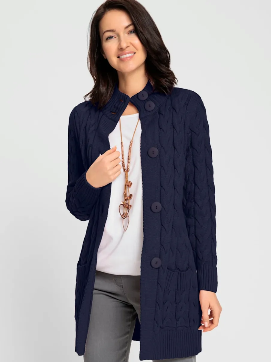 Veste longue tricotée avec col montant et poches