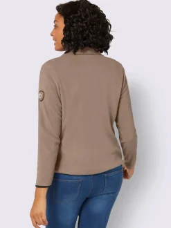 Veste polaire douce avec col transformable et poches zippées