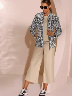 Veste réversible à col montant et manches longues