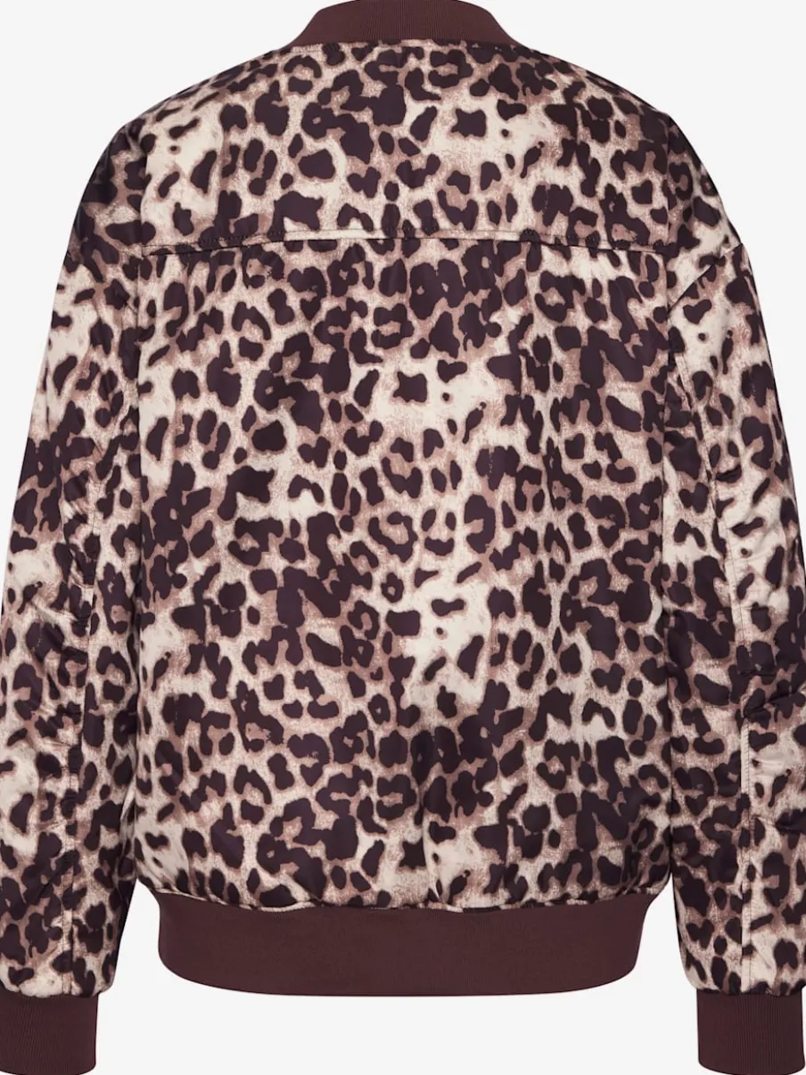 Veste réversible à motifs léopard avec poches fendues et bords-côtes doux