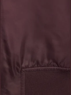 Veste réversible à motifs léopard avec poches fendues et bords-côtes doux
