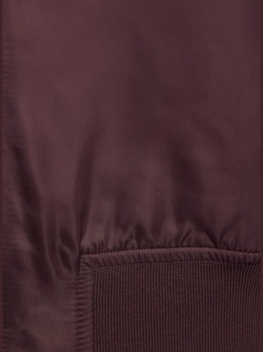 Veste réversible à motifs léopard avec poches fendues et bords-côtes doux