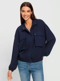 Veste sweat avec col montant et grandes poches